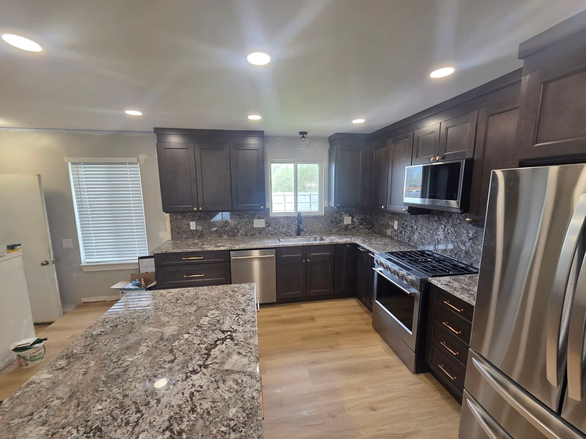 Granite waterfall countertop on a custom kitchen island